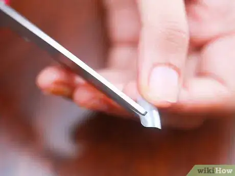 Image titled Make Easy Vampire Fangs Step 3