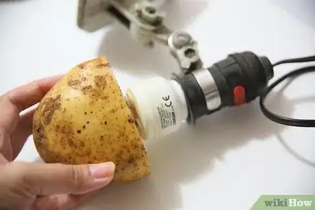 Image titled Remove a Broken Light Bulb with a Potato Step 4Bullet1