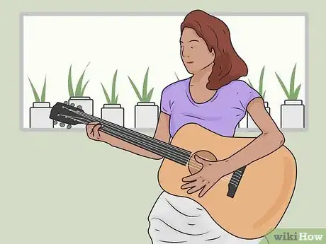 Image titled Reduce Tension when Playing Guitar Step 15