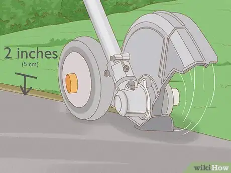 Image titled Weed Whip Fence and Curb Lines Step 11