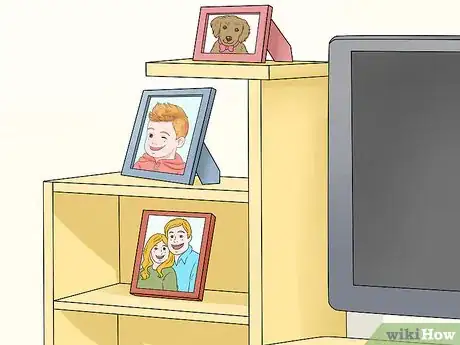 Image titled Decorate Entertainment Center Shelves Step 6