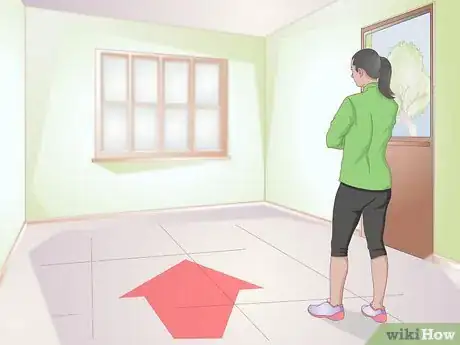 Image titled Clicker Train a Dog to Bow Step 3