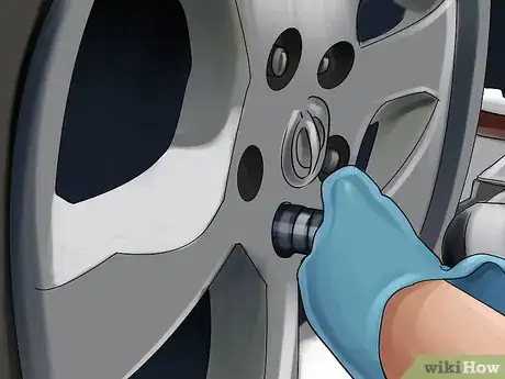 Image titled Install the Front Rotors and Brake Pads on Nissan Sentra 2.0L SR 2010 Step 1
