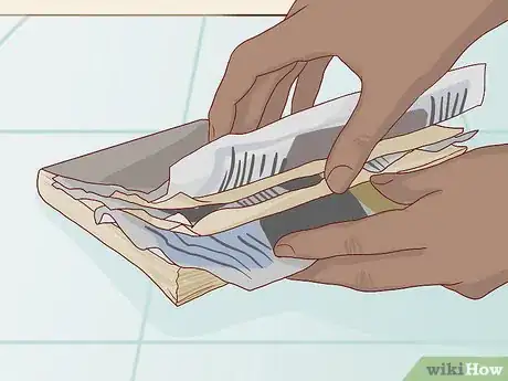 Image titled Remove the Mildew Smell from Books Step 9