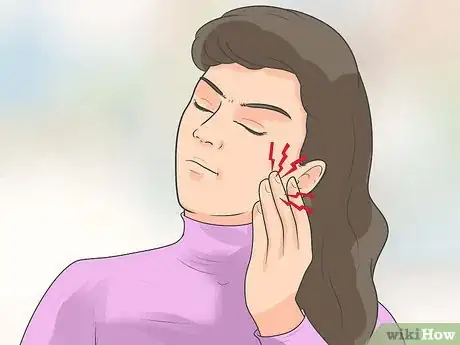 Image titled Relieve an Impacted Tooth Step 2