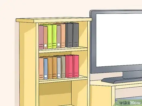 Image titled Decorate Entertainment Center Shelves Step 1