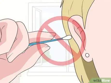 Image titled Remove Water from Ears Step 12
