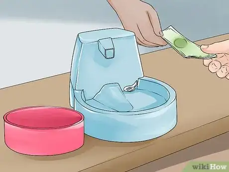 Image titled Get a Dog to Stop Drinking from the Toilet Step 10