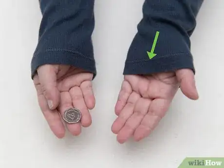 Image titled Make a Coin Disappear Step 15
