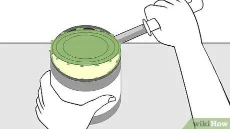 Image titled Open a Can Without a Can Opener Step 6