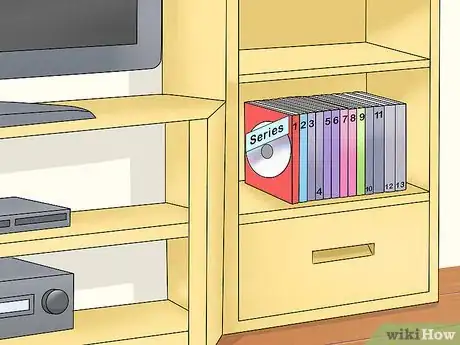 Image titled Decorate Entertainment Center Shelves Step 4