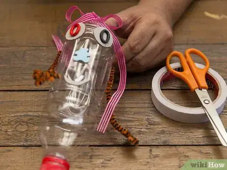Image titled Make a Puppet with an Empty Bottle and a Broom Stick Step 8