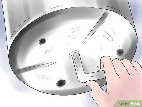 Image titled Remove a Glass from a Garbage Disposal Step 3