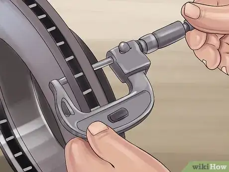 Image titled Install the Front Rotors and Brake Pads on Nissan Sentra 2.0L SR 2010 Step 7