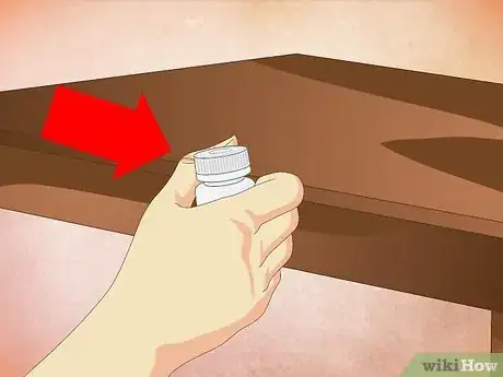 Image titled Open a Child Proof Pill Container Step 5