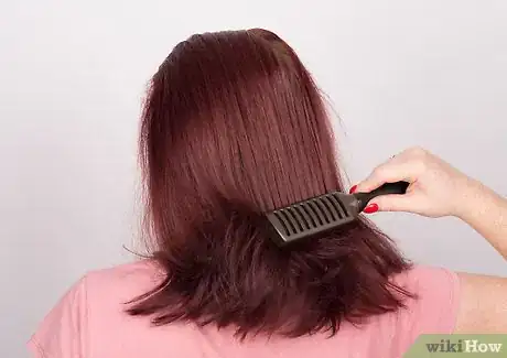 Image titled Do Curls with a Flat Iron Step 1