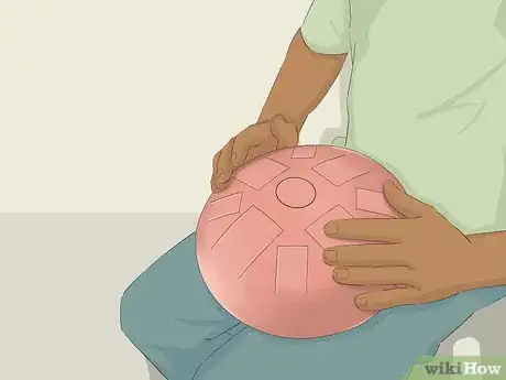 Image titled Play a Hue Drum Step 2