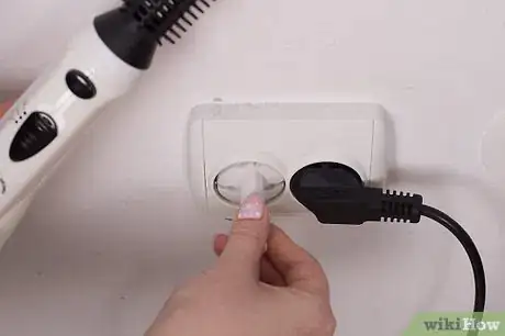 Image titled Curl Hair Using a Hot Air Brush Step 6