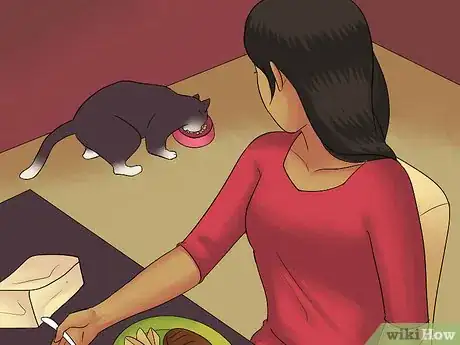 Image titled Eat Without a Cat Begging Step 5