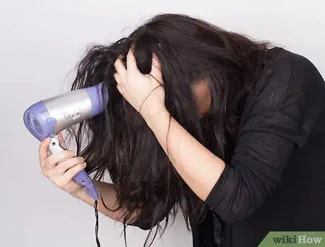 Image titled Wave Your Hair With a Flat Iron Step 12