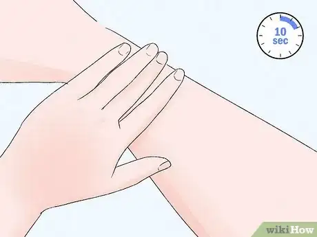 Image titled Apply Sunscreen Spray Step 4