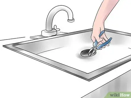 Image titled Remove a Glass from a Garbage Disposal Step 2