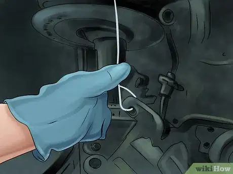 Image titled Install the Front Rotors and Brake Pads on Nissan Sentra 2.0L SR 2010 Step 3