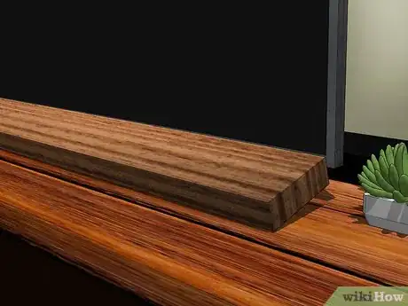 Image titled Decorate a TV Stand Step 5