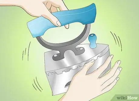 Image titled Use a Charcoal Iron Step 5