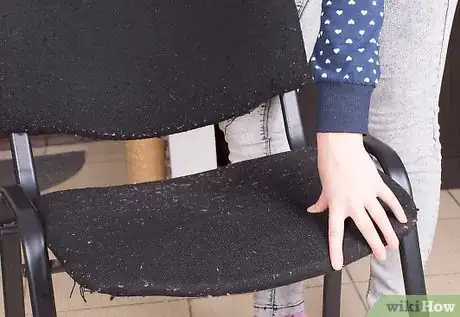 Image titled Sleep on a Chair Step 1