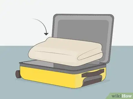 Image titled Pack a Wedding Dress Into Hand Luggage Step 8