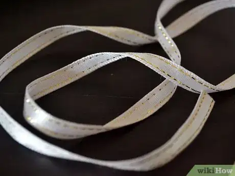 Image titled Make Clip on Hair Streaks Step 1