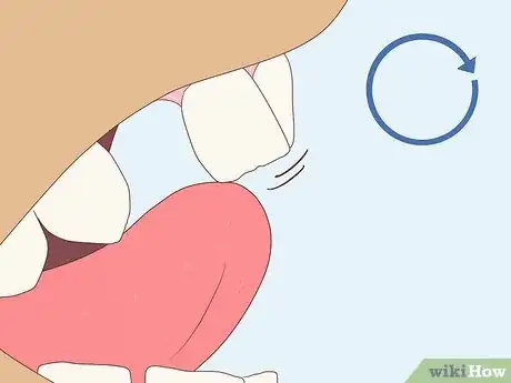 Image titled Pull a Loose Tooth at Home Step 2