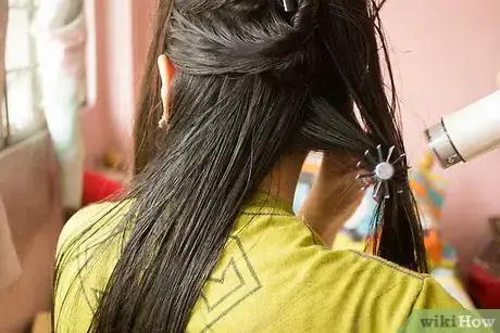 Image titled Straighten Hair with a Roller Brush Step 8