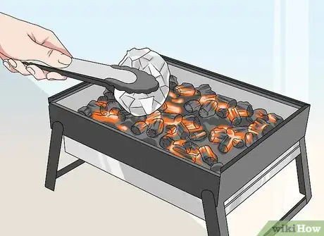 Image titled Bake a Cake Inside a Hollowed Orange over a Campfire Step 10
