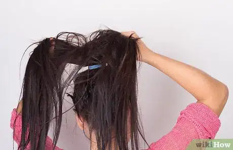 Image titled Put Frizzy Hair Into a Bun Step 3