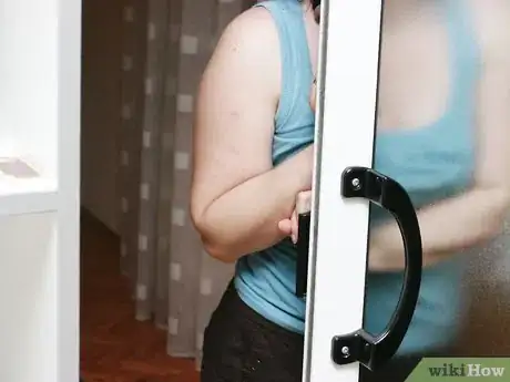 Image titled Prepare to Defend Yourself when You're Home Alone Step 6