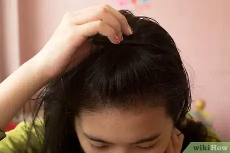 Image titled Straighten Hair with a Roller Brush Step 4