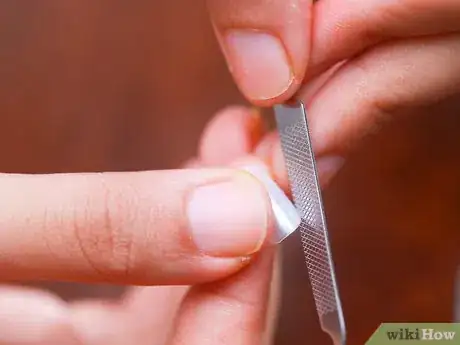 Image titled Make Easy Vampire Fangs Step 4