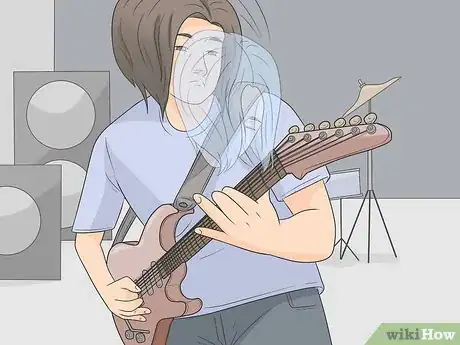 Image titled Do Guitar Moves Step 1