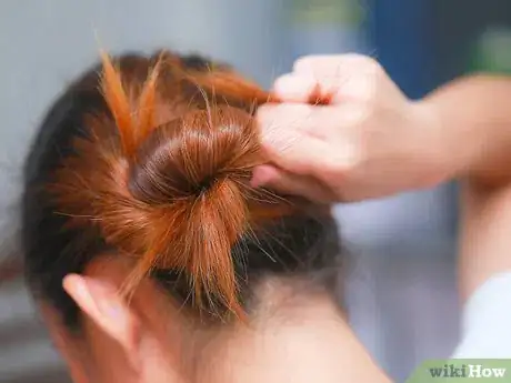 Image titled Do Hairstyles With a Twisty Bump Step 10