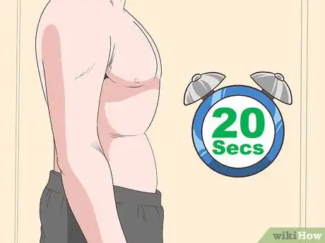 Image titled Do the Stomach Vacuum Exercise Step 5