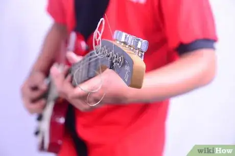 Image titled Make an Electric Guitar Into a Lap Steel Guitar Step 6