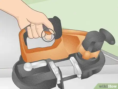 Image titled Use a Portable Bandsaw Step 2