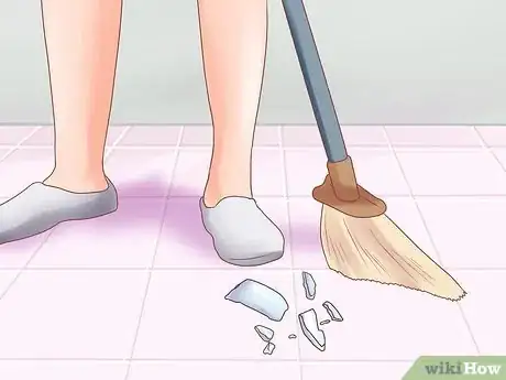 Image titled Remove a Broken Lightbulb from the Socket Step 2