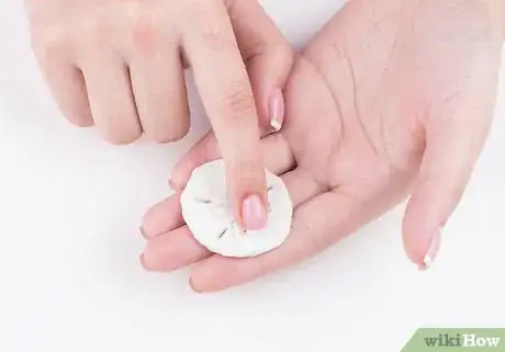 Image titled Clean Sand Dollars Step 1