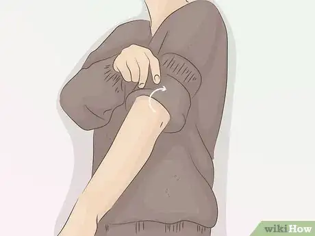 Image titled Roll Up Shirt Sleeves Step 18