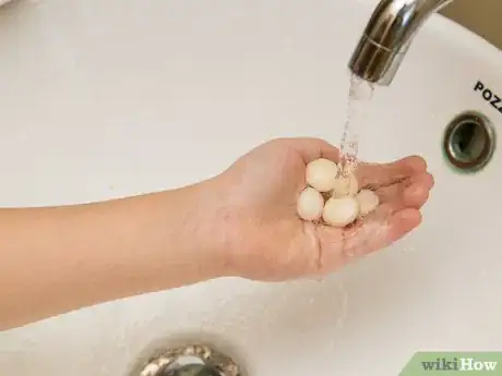 Image titled Make a Volcano out of Mentos and Soda Step 18