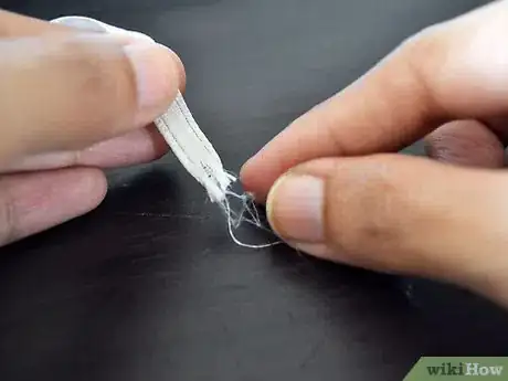 Image titled Make Clip on Hair Streaks Step 2