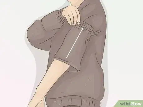 Image titled Roll Up Shirt Sleeves Step 17